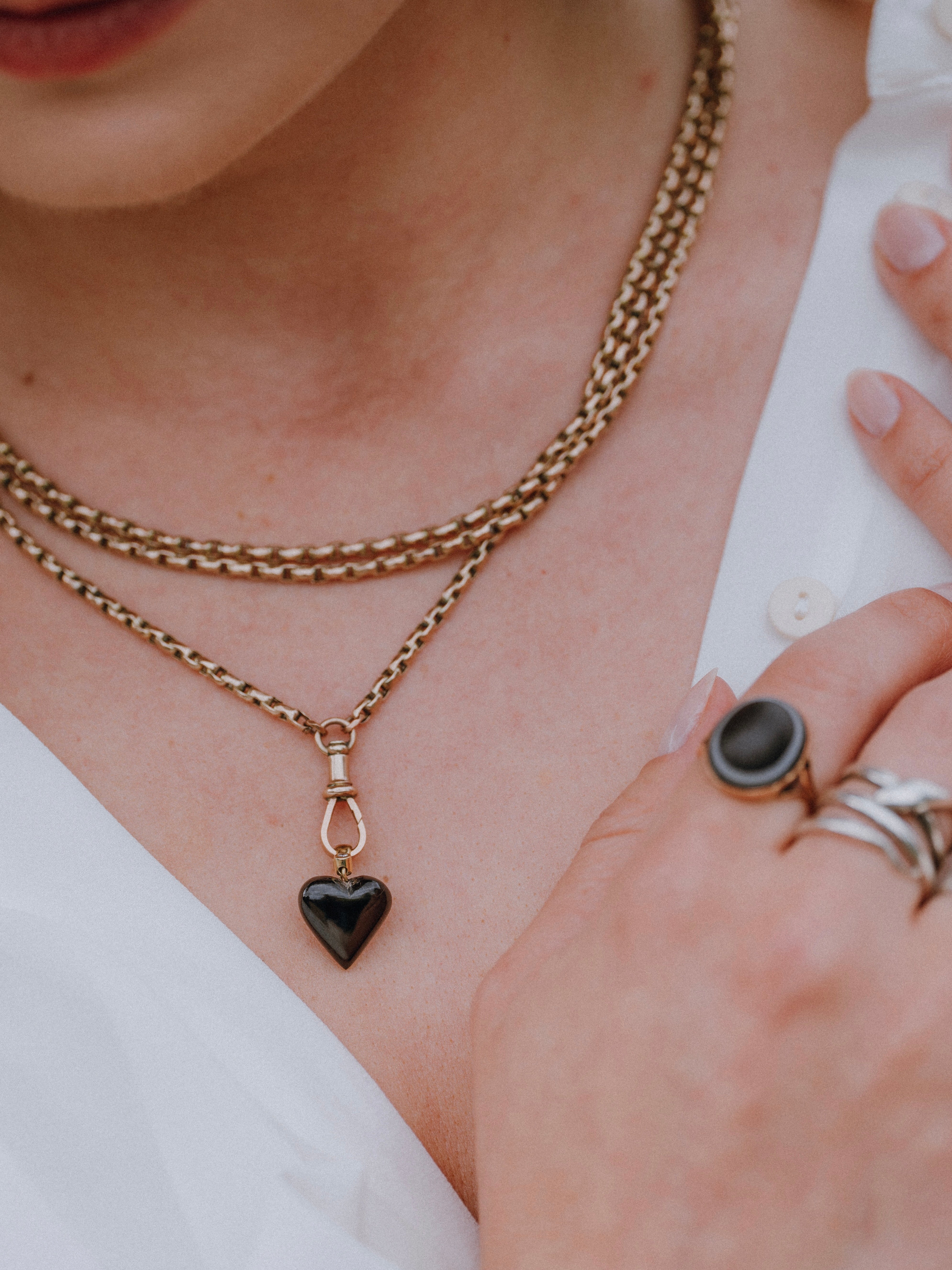 Onyx & Diamond Heart Pendant